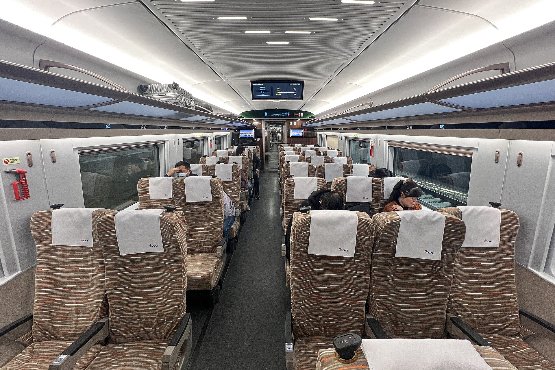Five-abreast second-class seating inside a CR400BF-GS high-speed train in January 2025.