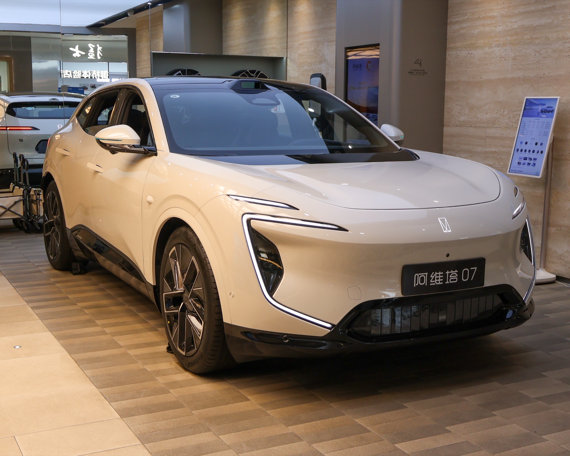 Display electric vehicle inside a Shanghai showroom, illustrative scene